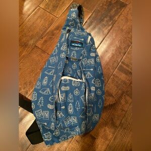 Kavu Rope Sling Bag in cotton canvas with camping theme.